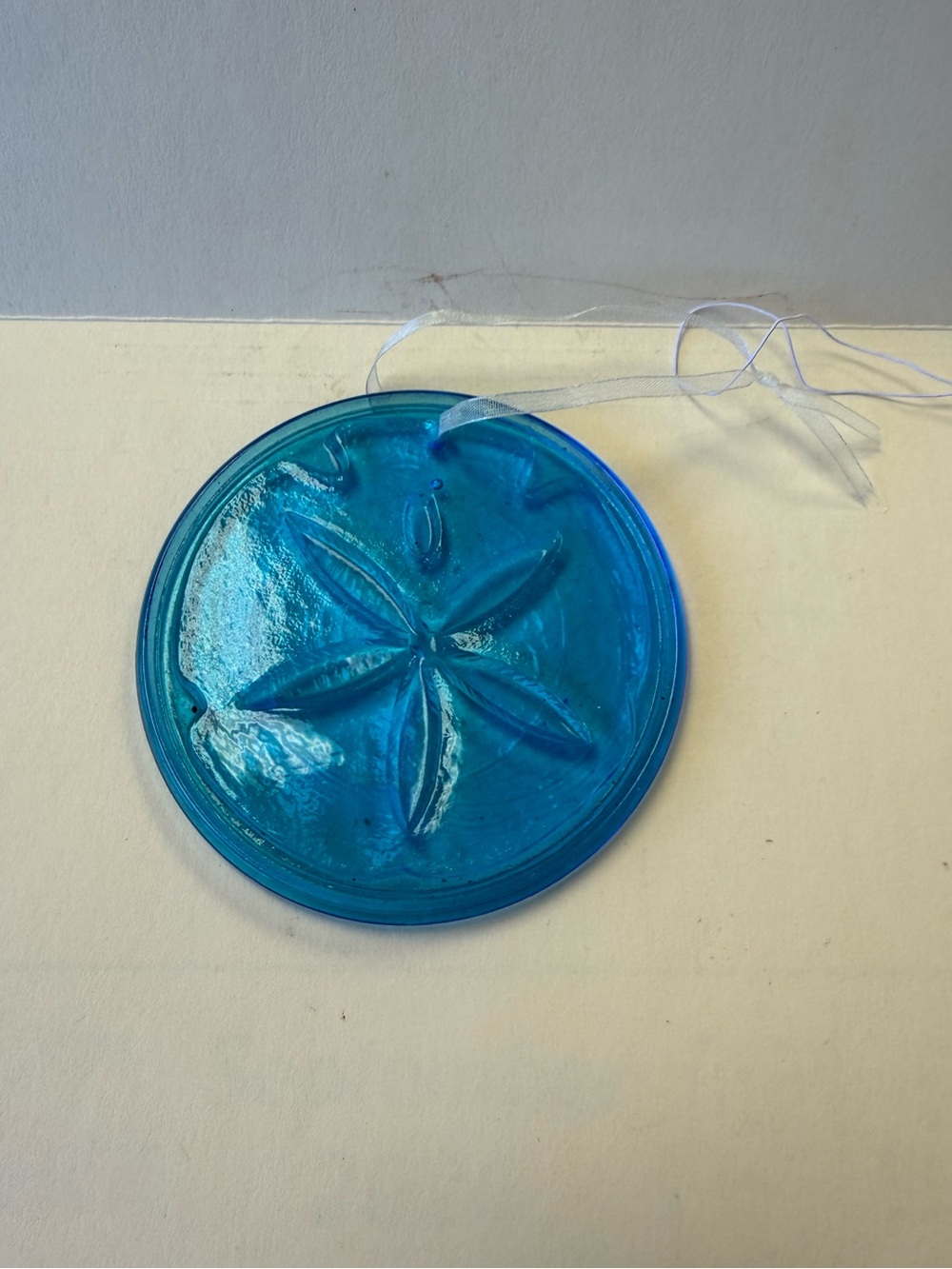 Pressed Blue Glass Sand Dollar Sun Catcher.